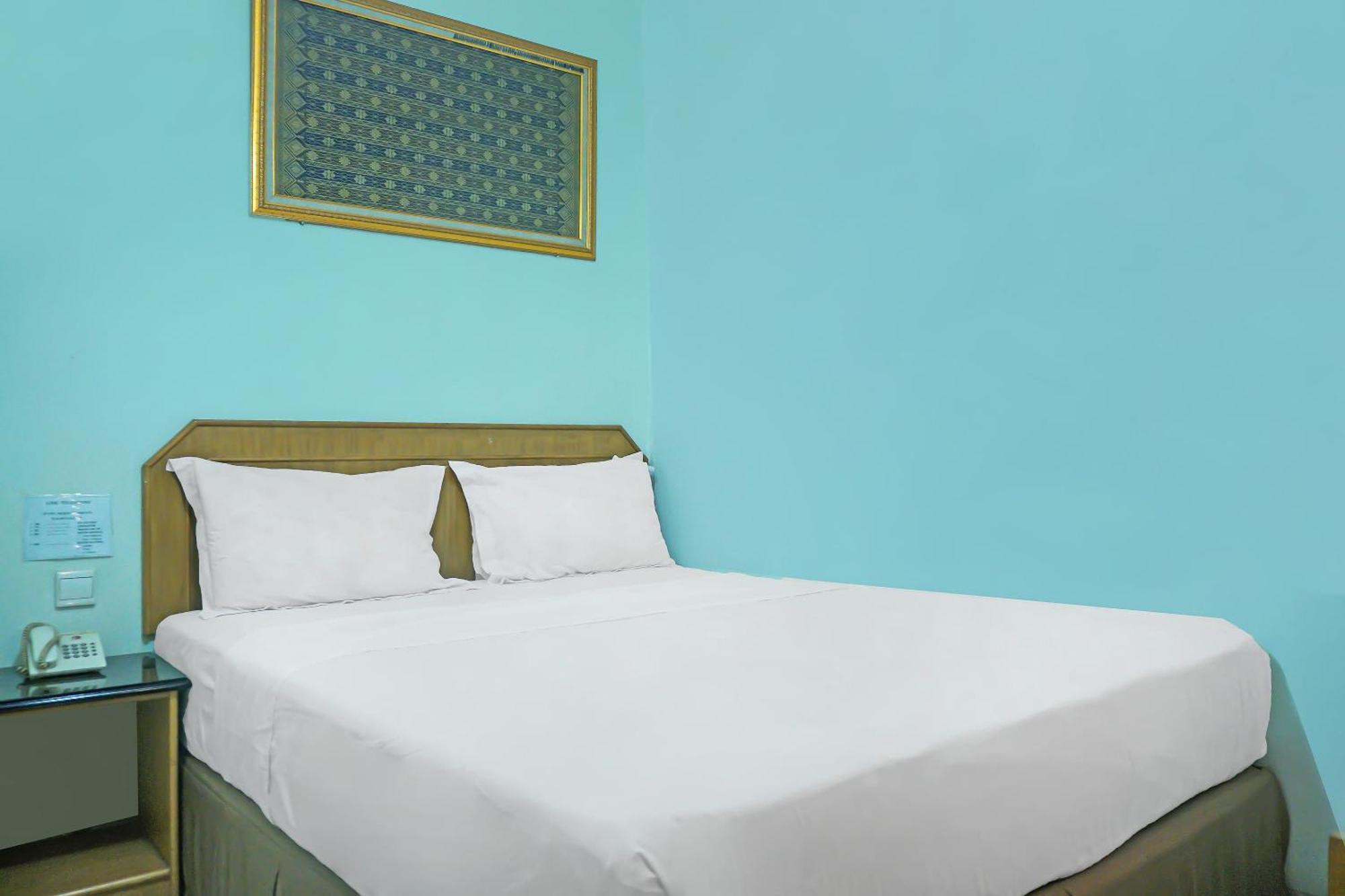 Super Oyo Collection O 92690 Hotel Limas Palembang Buitenkant foto