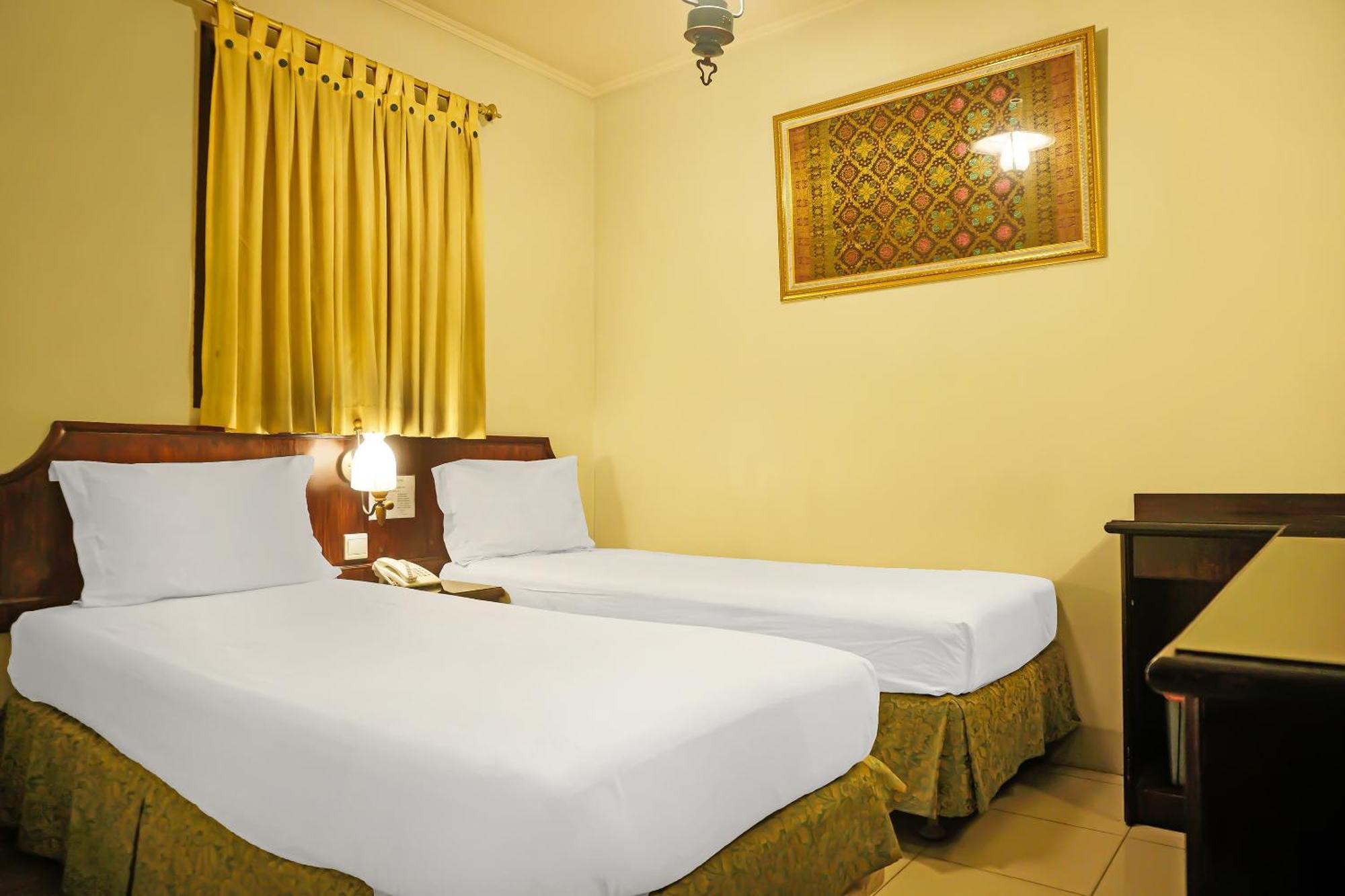 Super Oyo Collection O 92690 Hotel Limas Palembang Buitenkant foto