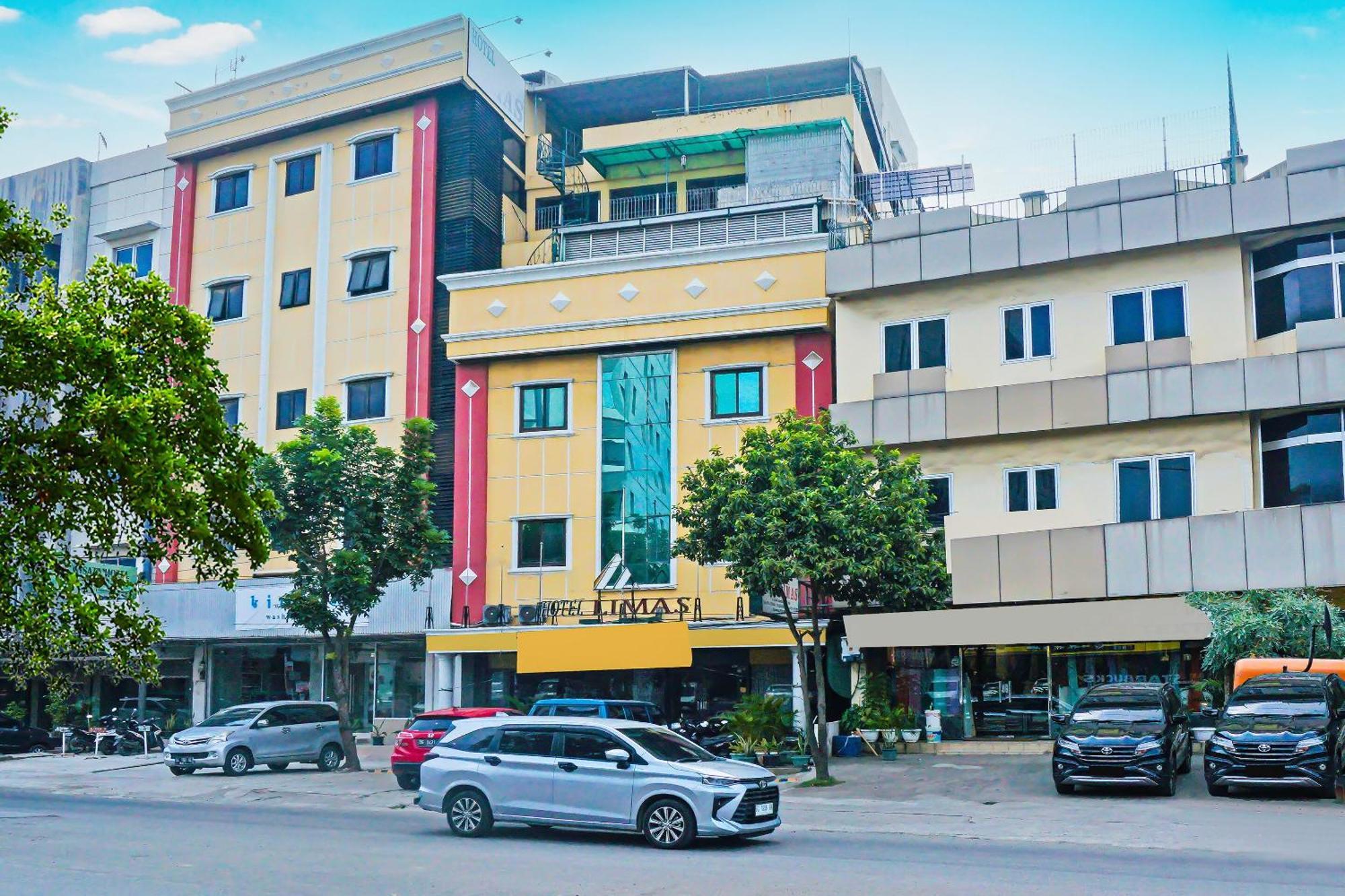 Super Oyo Collection O 92690 Hotel Limas Palembang Buitenkant foto